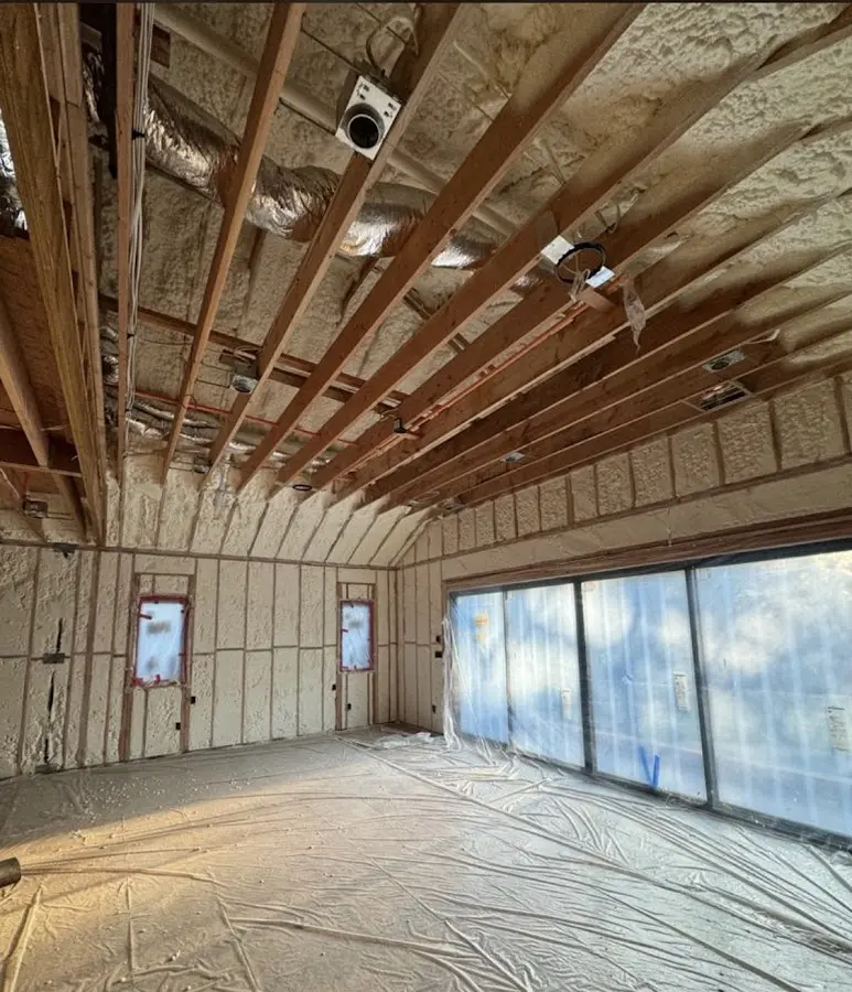 Interior walls and ceiling insulated with spray foam during new construction in Key West